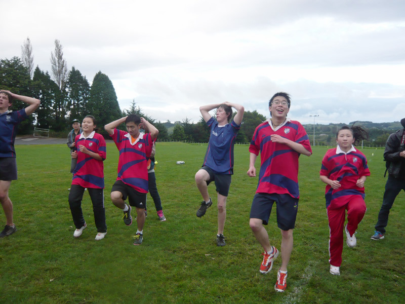 <p>Four recipients of the 2010 ZESPRI<sup>&reg;</sup> Outstanding Junior Athlete Awards, including (in red jersey, from left) Man Ka-kei (windsurfing), Wong Chun-wai (wushu), Chiu Chung-hei (table tennis) and Mok Uen-ying (wushu), join the Bethlehem College&rsquo;s rugby players for an aerobic fitness training session during the tour.</p>
