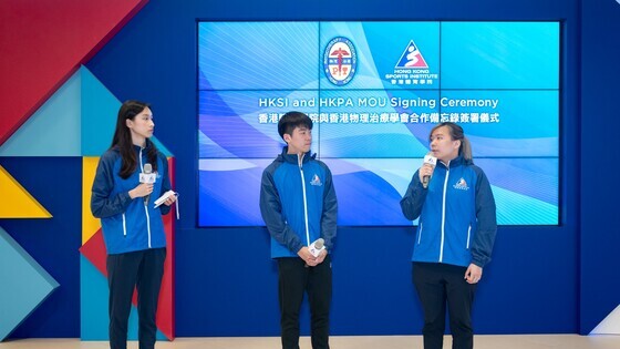 Triathlete Yip Tak-long (middle) and fencer Lai Hiu-tung (right),