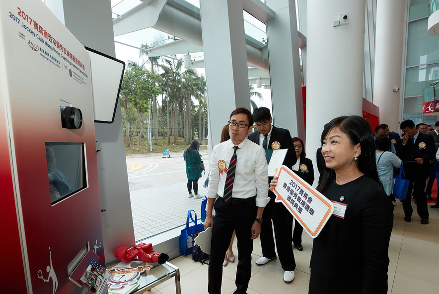 Guests took photos at the photo booth, capturing memorable moments at the event.