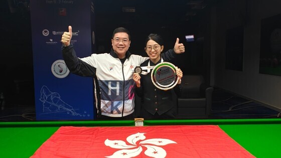 Ng On-yee (right)

Photo: Billiard Sports Council of Hong Kong China